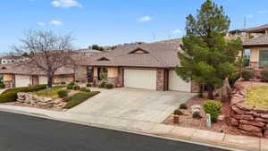 Single story home featuring a garage