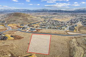 Drone / aerial view featuring a mountain view