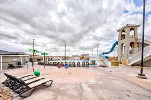 View of home's community with a playground