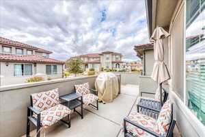 View of patio / terrace featuring a balcony