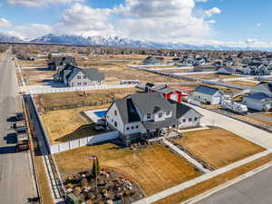 Birds eye view of property with a mountain view