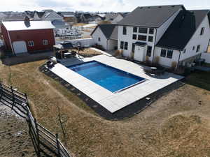 View of pool with a gazebo from drone.