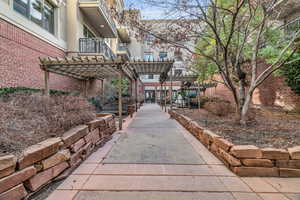 View of property's community featuring a pergola