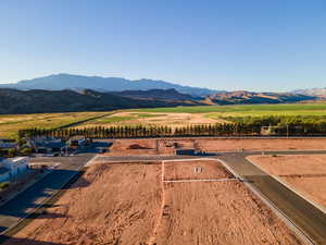 Aerial view featuring a rural view and a mountain view