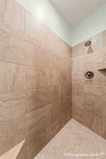 Bathroom with tiled shower