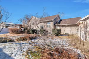 View of snow covered property