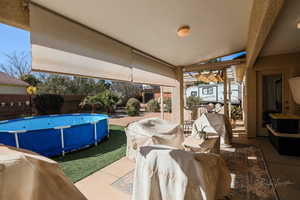 Covered patio with sunshades