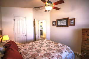 Bedroom with carpet flooring and ceiling fan