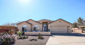 View of front of home with a garage