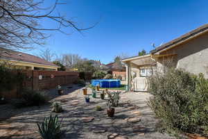 View of yard featuring a fenced in pool