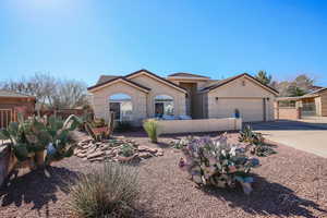 View of front of property featuring a garage