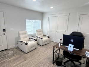 Office featuring hardwood / wood-style floors