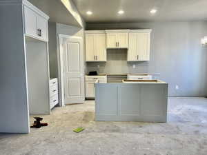 Kitchen with white cabinets