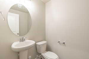 Bathroom featuring a sink and toilet