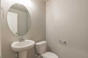 Bathroom featuring a sink and toilet