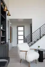 Stairway featuring hardwood / wood-style floors