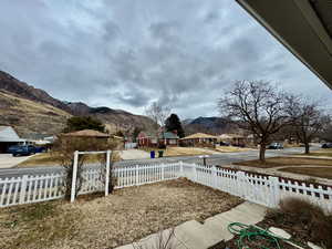 View of yard featuring a mountain view