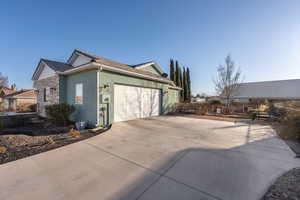 View of home's exterior with a garage