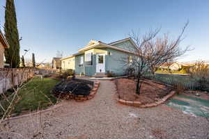 View of front of home featuring a yard