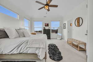 Primary bedroom with tons of natural light and gorgeous mountain views