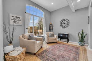 North facing living room with large windows