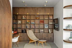 Sitting room featuring light tile patterned floors