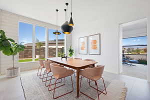 Dining room with light tile patterned floors