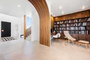 Interior space with built in shelves and built in desk