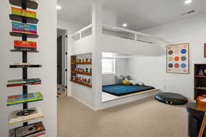 Bedroom with carpet flooring