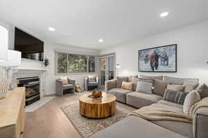 Living room with light wood-type flooring