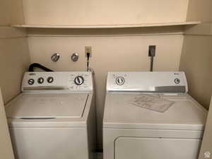 Laundry room with washing machine and dryer