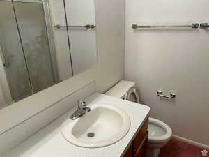 Bathroom with vanity and toilet