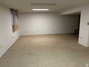 Empty room featuring carpet floors