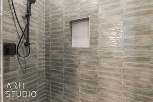 Bathroom with tiled shower