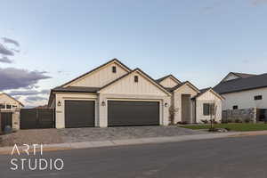 View of front facade featuring a garage