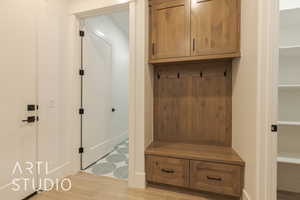 Mudroom featuring light hardwood / wood-style flooring