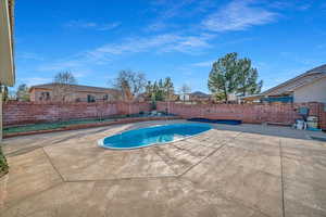 View of pool with a patio area