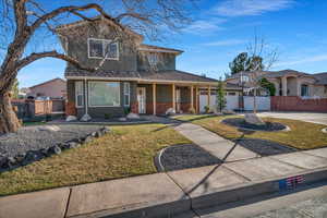 View of front of house with a front lawn