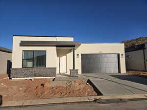 Modern home featuring a garage