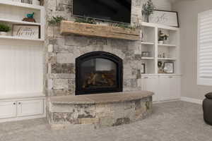 Details with a stone fireplace