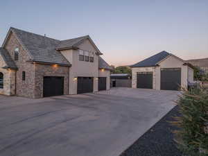 View of property exterior at dusk