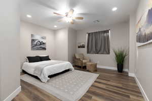 Bedroom with wood-type flooring and ceiling fan