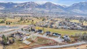 Birds eye view of property featuring a mountain view