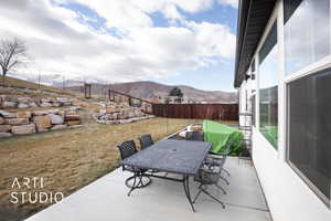 View of patio / terrace with a mountain view