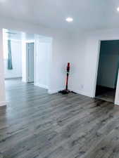 Spare room featuring dark hardwood / wood-style flooring