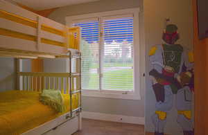 Unfurnished bedroom featuring light hardwood / wood-style flooring