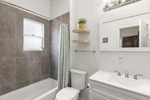 Large Full Bathroom with Tile Surround and Window