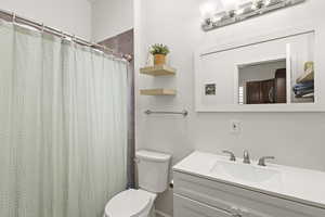 Large Full Bathroom with Tile Surround and Window