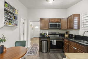 Kitchen with New Vinyl flooring, Microwave, Range