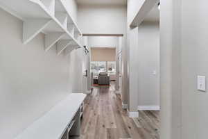 Mudroom with light wood-type flooring